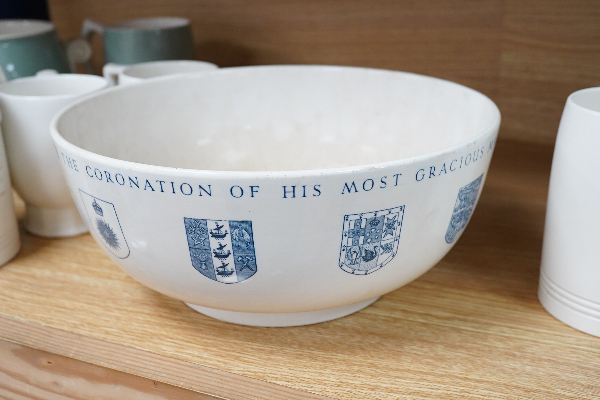 Keith Murray for Wedgwood - a Coronation bowl dated 1937 and mugs dated 1937 and 1953